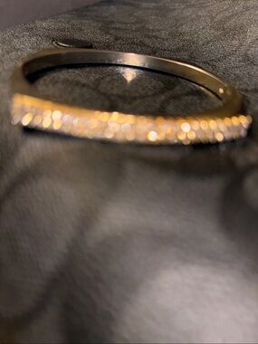 Donating 
Beautiful gold tone bracelet